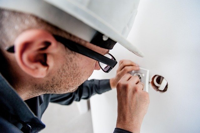 Electrician inspecting an electrical installation